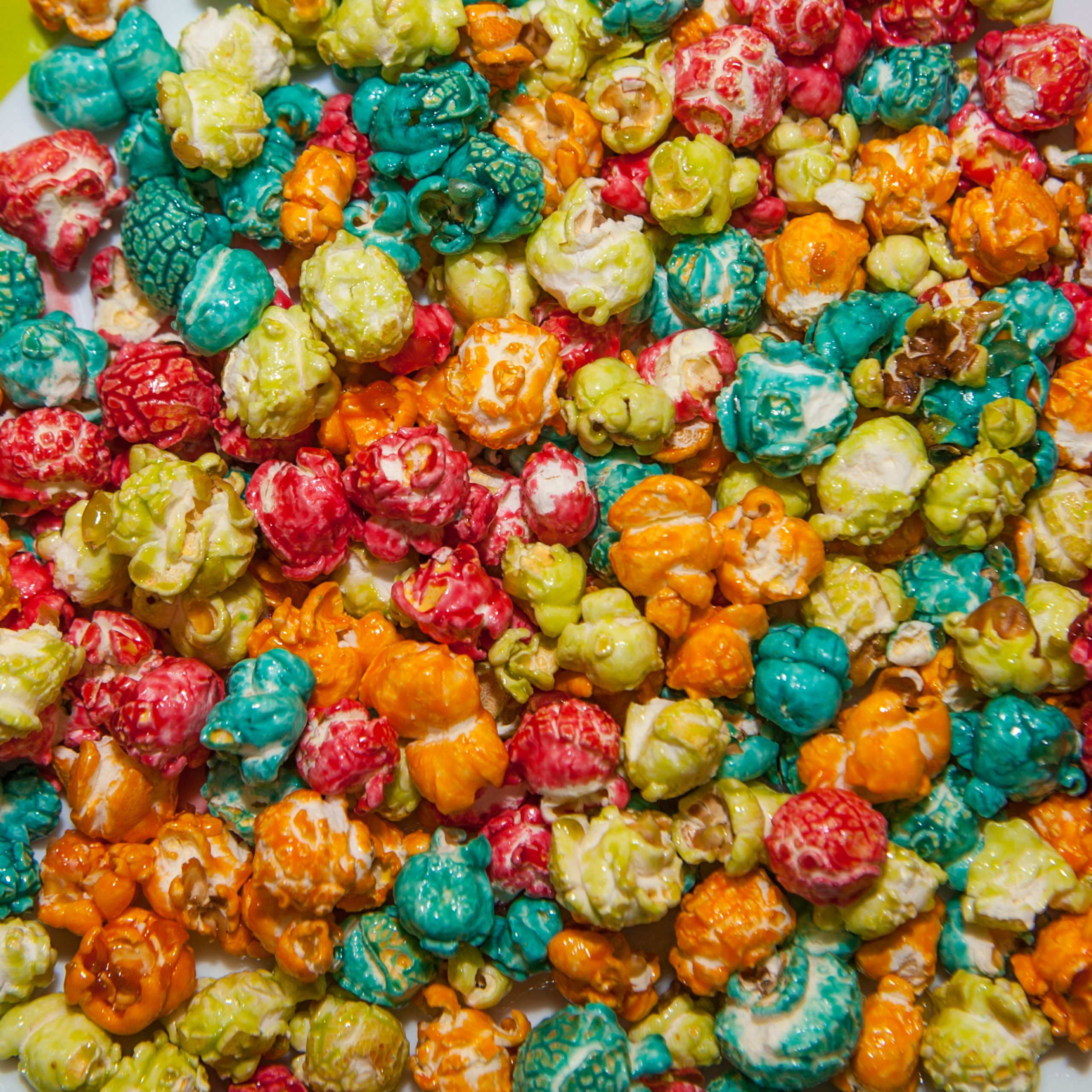 sweet colored popcorn with caramel syrup
